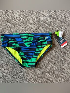 Speedo Disco Boom competition swim briefs size 32, team royal blue bright green